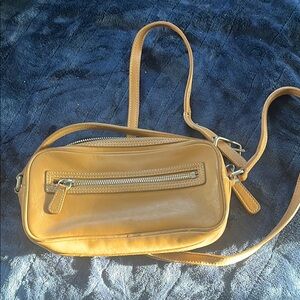 Vintage light brown leather Coach bag.